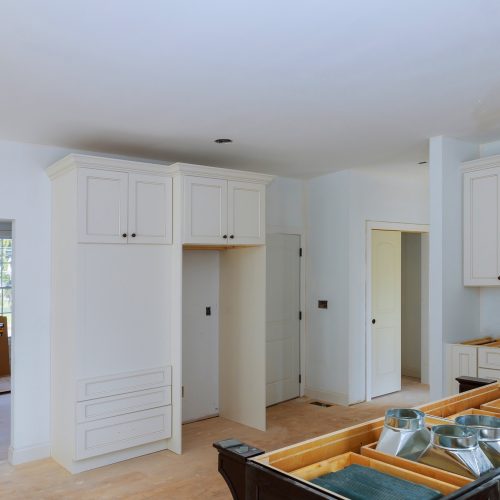 Interior design construction of a kitchen with in new cabinet home addition