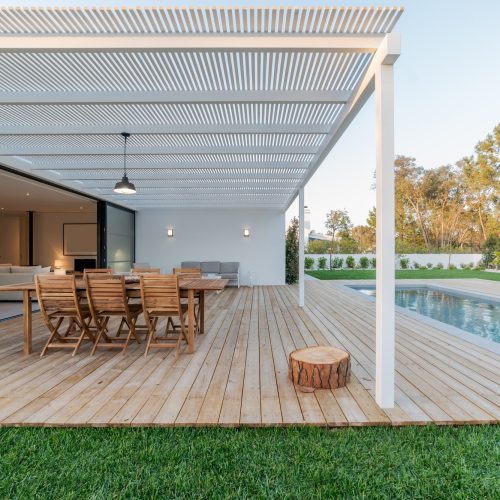 Modern villa with pool and deck with interior view