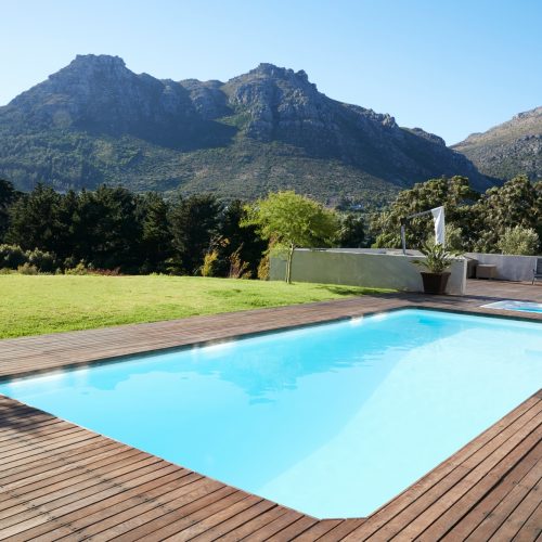 Outdoor Swimming Pool Surrounded With Wooden Decking
